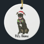 Personalized Black Pitbull Staffy Santa Hat Bowtie Ceramic Ornament<br><div class="desc">Make the nice list this year with an ornament of your favourite pitbull elf! For the sweetest gifts, pair it with a matching art print or another item from my collection for a thoughtful housewarming, bridal shower, teacher, mother-in-law, husband, boyfriend, secret santa, sympathy, or tough-to-shop-for gift! To see more work...</div>
