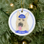 Personalized Black & Tan German Shepherd Hanukkah Ceramic Ornament<br><div class="desc">Celebrate your favourite mensch on a bench with personalized ornament! This design features a sweet illustration of a black and tan german shepherd dog with a blue and white yarmulke. For the most thoughtful gifts, pair it with another item from my collection! To see more work and learn about this...</div>