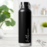 Personalized Black Your Name Script Minimalist Water Bottle<br><div class="desc">Simple yet stunning.  Personalize this water bottle with your name,  or a loved ones name.  A simple elegant script typography with a girly edge.  Change out the background and font colours to anything you want. Black White Trendy Simple Your Name Minimalist Water Bottle</div>