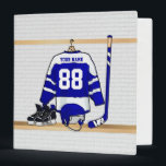 Personalized Blue and White Ice Hockey Jersey Binder<br><div class="desc">A personalized ice hockey jersey in blue and white hanging in a sports locker room with a helmet, ice skates and an ice hockey stick. The jersey can be fully customized with the number and name of your choice to make a great gift for the ice hockey fan, ice hockey...</div>
