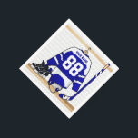 Personalized Blue and White Ice Hockey Jersey Napkin<br><div class="desc">A personalized ice hockey jersey in blue and white hanging in a sports locker room with a helmet, ice skates and an ice hockey stick. The jersey can be fully customized with the number and name of your choice to make a great gift for the ice hockey fan, ice hockey...</div>