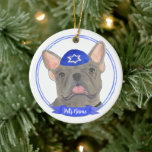 Personalized Blue Grey Frenchie Hanukkah Ceramic Ornament<br><div class="desc">Celebrate your favourite mensch on a bench with personalized ornament! This design features a sweet illustration of a blue grey french bulldog or frenchie dog with a blue and white yarmulke. For the most thoughtful gifts, pair it with another item from my collection! To see more work and learn about...</div>