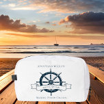 Personalized Boat Captain Vintage Nautical Wheel Dopp Kit<br><div class="desc">Chic custom boat captain cosmetic bag for an ocean liner company featuring a navy blue boat steering wheel. This vintage nautical themed design is perfect for a ship helmsman near the beach. Personalize with your name.</div>