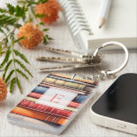 Personalized Book Lover Monogram  Keychain<br><div class="desc">A charming book‑lover keychain featuring a colourful stack of illustrated book spines and a personalized monogram framed in a classic, literary style. Perfect for readers who want to carry a little piece of their bookish world wherever they go, this custom keychain adds warmth and personality to bags, keys, backpacks, and...</div>