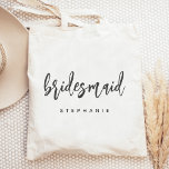 Personalized Bridesmaid Handwriting Script Tote Bag<br><div class="desc">This simple,  elegant tote bag features the word "bridesmaid" in charcoal grey handwriting script. Personalize it with her name in sans serif font. Makes a perfect bridesmaid gift!</div>