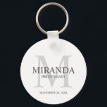 Personalized Bridesmaid's Monogram and Name Keychain<br><div class="desc">Add a personal touch to your wedding with personalized bridesmaid's monogram and name gift. This design features personalized bridesmaid's name with title and wedding date in grey and monogram in light grey as background, in classic serif font style, on white background. Also perfect for maid of honour, mother of the...</div>
