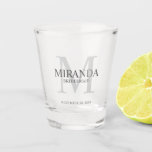 Personalized Bridesmaid's Monogram and Name Shot Glass<br><div class="desc">Add a personal touch to your wedding with personalized bridesmaid's monogram and name gift. This design features personalized bridesmaid's name with title and wedding date in grey and monogram in light grey as background, in classic serif font style. Also perfect for maid of honour, mother of the bride and more....</div>