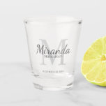 Personalized Bridesmaid's Monogram and Name Shot Glass<br><div class="desc">Personalized Bridesmaids Gifts features personalized bridesmaid's name in grey classic script font style and monogram in light grey classic serif font style as background with title and wedding date in grey classic serif font style on white background. Also perfect for maid of honour, flower girl, mother of the bride and...</div>