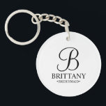 Personalized Bridesmaid's Name and Monogram Keychain<br><div class="desc">Elegant Personalized Bridesmaid Gifts
featuring personalized monogram in black elegant script font style with bridesmaid's name and title in classic serif font style on white background.

Also perfect for groomsmen,  best man,  father of the bride,  maid of honour,  flower girl,  mother of the bride and more.</div>
