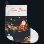 personalized Christmas santa is coming stocking<br><div class="desc">Christmas santa is coming stocking is personalized with first name</div>