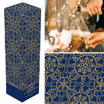 Personalized Christmas Snowflake Blue Gold Gift Wine Box<br><div class="desc">Add the wow factor to your bottle of wine or Champagne with a personalized gift box! This elegant winter-themed design features the words 'Merry Christmas' and can be personalized with the recipient's name or a family name and the holiday year. A stylish all-over pattern adorned with interconnected flower shapes, heart-shaped...</div>