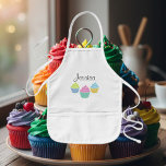 Personalized cupcake baking apron for children<br><div class="desc">Personalized cupcake baking apron for children. In beige,  yellow or white. Funny baker gift for little kids and cupcake lovers. Girlie girl design with elegant script text. Colourful image with pastel colours pink blue green etc. Fun birthday party idea.</div>