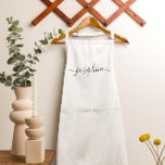 Personalized elegant script name white standard apron<br><div class="desc">Hosting a botanical, succulent workshop? How about a cooking class? Give out personalized white aprons for your guests with an elegant font script type that will surely delight them. Have the talking about this sophisticated giveaway. Tip: to keep the long swashes at the end keep the small squares at the...</div>