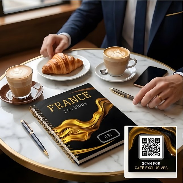 Personalized Executive Opulent: Achempon 2026 Gold Planner (2026 Global Elite black and gold notebook at a luxury café setting. Fully customizable on Zazzle. ☕✨)