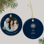 Personalized Family Christmas Ornament<br><div class="desc">Celebrate the joy and togetherness of the holiday season with our Personalized Family Christmas Ornament. The front showcases a cherished family photo framed by an elegant snowflake design, while the family name adds a personal touch. On the back, "Joy Love" captures the heartwarming spirit of your family, along with the...</div>