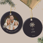 Personalized Family Photo Christmas Ornament<br><div class="desc">Celebrate the joy and togetherness of the holiday season with our Personalized Family Photo Christmas Ornament. The front showcases a cherished family photo framed by an elegant snowflake design, while the family name adds a personal touch. On the back, "Joy Love" captures the heartwarming spirit of your family, along with...</div>