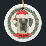 Personalized Fawn Masked Great Dane Ceramic Ornament<br><div class="desc">Make the nice list this year with a personalized Great Dane ornament of your sweet fawn masked great dane in a red santa hat and holly wreath! For the sweetest gifts,  pair it with a matching art print or another item from my collection!</div>