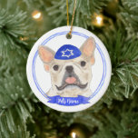 Personalized Fawn Tan Frenchie Dog Hanukkah Ceramic Ornament<br><div class="desc">Celebrate your favourite mensch on a bench with a personalized ornament! This design features a sweet illustration of an entlebucher mountain dog with a blue and white yarmulke. For the most thoughtful gifts, pair it with another item from my collection! To see more work and learn about this artist, visit...</div>