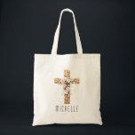 Personalized Floral Cross Religious Easter Tote Bag<br><div class="desc">This beautifully personalized Easter tote bag showcases a rustic wooden cross adorned with soft watercolor spring florals, making it a meaningful and elegant gift for the Easter season. Add any name to create a heartfelt custom keepsake perfect for church, First Communion, Confirmation, or Easter Sunday celebrations. It's an ideal gift...</div>
