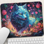 Personalized Floral Mystical Wolf Mouse Pad<br><div class="desc">Transform your workspace into a mystical haven with this personalized mouse pad featuring a majestic wolf howling amidst an enchanted forest. The captivating scene, illuminated by the moon's ethereal glow, evokes a sense of wonder and adventure. Add a personal touch with your name or a meaningful quote. The smooth surface...</div>