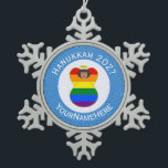 Personalized Gay Pride Brown Angel Hanukkah Flag Snowflake Pewter Christmas Ornament<br><div class="desc">Dark skinned angel, could be LatinX or Asian, wears the Gay Pride Rainbow Flag on this snowflake pewter ornament for Hanukkah decor. The Gay Pride Hanukkah Angel for LGBTQ is inside a circle of white squiggly squares surrounded by a background of blue squiggly squares. Add a name to personalize and...</div>