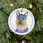 Personalized German Shepherd Dog Hanukkah Ceramic Ornament<br><div class="desc">Celebrate your favourite mensch on a bench with a personalized ornament! This design features a sweet illustration of a german shepherd dog with a blue and white yarmulke. For the most thoughtful gifts, pair it with another item from my collection! To see more work and learn about this artist, visit...</div>