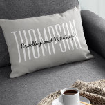 Personalized Gift Modern Grey Family Name Lumbar Pillow<br><div class="desc">Simple modern family home pillow featuring a classic grey background,  your last name in a large clean typeface and your first names.

Everything on this pillow can be customized to suit the style of your home,  this would be a cool gift for newlyweds.</div>