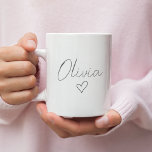Personalized Girly Gift Mug with Name & Heart | Cu<br><div class="desc">Add a personal touch to your drinkware with this adorable personalized girly gift mug featuring a custom name and a charming heart design. Perfect for coffee, tea, or any beverage, this mug is a sweet and thoughtful gift for friends, sisters, moms, or anyone who loves stylish and feminine accessories. Whether...</div>