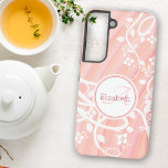Personalized Girly Monogram Name Pink White Floral Samsung Galaxy Case<br><div class="desc">This design features white floral and vine art over soft pink and peach streaked background. Personalize the text fields with a first or last name and initial,  remove the text or edit using the design tool to select a font style,  size,  and colour you prefer.</div>