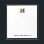 Personalized Gold Monogram Black White Notepad<br><div class="desc">Elevate your stationery game with this monogrammed notepad featuring classic block typography and a brushed gold medallion monogram and black trim. The notepad includes space for your name or custom text, making it perfect for personal or professional use. Use it to jot down notes, ideas, and reminders in style. It...</div>
