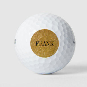 Personalized golf balls with gold glitter monogram