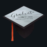 Personalized  graduation cap topper<br><div class="desc">Celebrate the big day with this elegant grey cap topper.
It is decorated with the word Graduate in sylish script typography.
Customize it with the year and your name or that of your school.</div>