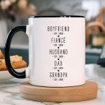 Personalized Grandpa Milestones Gift Mug<br><div class="desc">This sentimental black and white mug design offers a heartfelt tribute to the full journey of love and family, showcasing a simple yet powerful progression from boyfriend to fiancé, husband, dad, and grandpa. Each title is paired with the year, separated by small heart icons for a sweet, cohesive touch. The...</div>