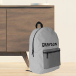 Personalized Grey Printed Backpack<br><div class="desc">Outfit any occasion with a personalized backpack featuring your name in sleek black font! This durable bag comes in a stylish grey,  easily transitioning from day-to-day life to weekend adventures.</div>