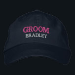 Personalized Groom Bachelor Party Custom Embroidered Hat<br><div class="desc">Add a name and the role to play at the wedding by clicking the "Personalized" button. This chic and stylish cap serves as the perfect memento of a memorable getaway with your favourite buddies. The front of the cap showcases a captivating sports-inspired "Groom" typography that perfectly captures the fun and...</div>
