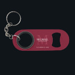 Personalized Groomsman's Monogram and Name Keychain Bottle Opener<br><div class="desc">Add a personal touch to your wedding with personalized groomsman's monogram and name gift. This design features personalized groomsman's name with title and wedding date in white and monogram in light burgundy red as background, in classic serif font style, on burgundy red background. Also perfect for best man, father of...</div>