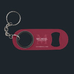 Personalized Groomsman's Monogram and Name Keychain Bottle Opener<br><div class="desc">Add a personal touch to your wedding with personalized groomsman's monogram and name gift. This design features personalized groomsman's name with title and wedding date in white and monogram in light burgundy red as background, in classic serif font style, on burgundy red background. Also perfect for best man, father of...</div>