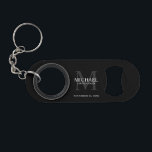 Personalized Groomsman's Monogram and Name Keychain Bottle Opener<br><div class="desc">Add a personal touch to your wedding with personalized groomsman's monogram and name gift. This design features personalized groomsman's name with title and wedding date in white and monogram in light grey as background, in classic serif font style, on black background. Also perfect for best man, father of the bride,...</div>