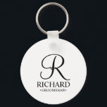 Personalized Groomsman's Name and Monogram Keychain<br><div class="desc">Elegant Black and White Personalized Groomsman Gifts
featuring personalized monogram in black elegant script font style with groomsman's name and title in classic serif font style on white background.

Also perfect for best man,  father of the bride,  bridesmaid,  maid of honour,  flower girl,  mother of the bride and more.</div>