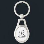 Personalized Groomsman's Name and Monogram Keychain<br><div class="desc">Elegant Black and White Personalized Groomsman Gifts
featuring personalized monogram in black elegant script font style with groomsman's name and title in classic serif font style on white background.

Also perfect for best man,  father of the bride,  bridesmaid,  maid of honour,  flower girl,  mother of the bride and more.</div>