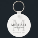 Personalized Groomsmen's name and monogram Keychain<br><div class="desc">Add a personal touch to your wedding with personalized groomsmen keychain. This keychain features personalized groomsman's name with title and wedding date in grey and monogram in light grey as background, in classic serif font style, on white background. Also perfect for best man, father of the bride, ring bearer and...</div>