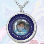 Personalized Happy Nurse Retirement Gifts Blue Silver Plated Necklace<br><div class="desc">Our Personalized Happy Nurse Retirement Gifts Silver Plated Necklace is a beautiful and sentimental gift option for retired nurses. This is designed to honour their years of hard work and dedication. It features a photo, and you can customize the text. The necklace serves as a reminder of their impact on...</div>
