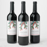 Personalized Holly and Berries Christmas Holiday Wine Label<br><div class="desc">A festive holiday design for the Christmas season, this custom wine label has sprigs of watercolor holly and berries cascading from the top of the design. The text template includes a sample holiday greeting along with your name and the type of wine. Personalize the text with your desired wording for...</div>