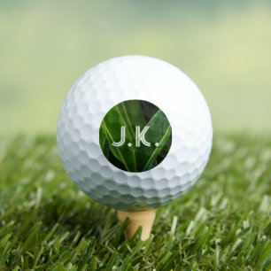 Personalized initials & green leaves golf balls