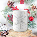Personalized Let it Snow Snowflakes Mug<br><div class="desc">Enjoy the snow with this winter coffee mug decorated with gold and silver snowflakes. Personalize with a name on one side and the other side has the words "Let it Snow"</div>