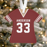 Personalized Maroon Football Jersey Ornament<br><div class="desc">Celebrate your favourite football player or team with this personalized maroon and white jersey ornament. Perfect for commemorating a winning season,  special player,  or team. Customize it with a name and number to create a unique keepsake.</div>
