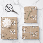 Personalized Merry Christmas Kraft Monogram   Wrapping Paper Sheet<br><div class="desc">A personalized "Merry Christmas" monogram design with a Xmas a kraft brown paper look background. An ideal festive custom design for the holiday season. Customize the monogram and make it your own!</div>