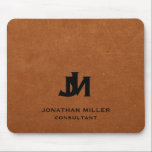 Personalized Minimal Sable Leather Monogram Mouse Pad<br><div class="desc">Add a touch of luxury to your workspace with this personalized mouse pad. The design features two overlapping monogram initials in classic black block typography with your name and title below on a stylish sable brown leather background. The high-quality printing ensures that the design will last for years to come....</div>