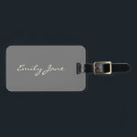 Personalized Minimalist Elegant Script Destination Luggage Tag<br><div class="desc">Add a touch of elegance to every journey with this personalized luggage tag, featuring a custom name in flowing white script on a soft grey background. Clean, minimalist, and effortlessly stylish, it’s perfect for honeymooners, jet-setting bridesmaids, or anyone who loves polished travel accessories. Makes a thoughtful bridal party favour, graduation...</div>
