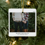 Personalized Minimalistic Single Photo Christmas Ceramic Ornament<br><div class="desc">Celebrate the holiday season with our Personalized Minimalistic Single Photo Christmas Ceramic Ornament. This elegant ornament combines classic traditional charm with a sleek, minimalistic design. Featuring a timeless black and white colour scheme, it offers a clean and simple aesthetic that will complement any Christmas tree. Customizable with a single photo,...</div>